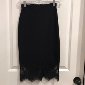 High waisted black lace pencil skirt.